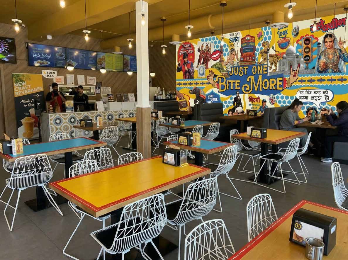An Eggholic store interior with the new murals