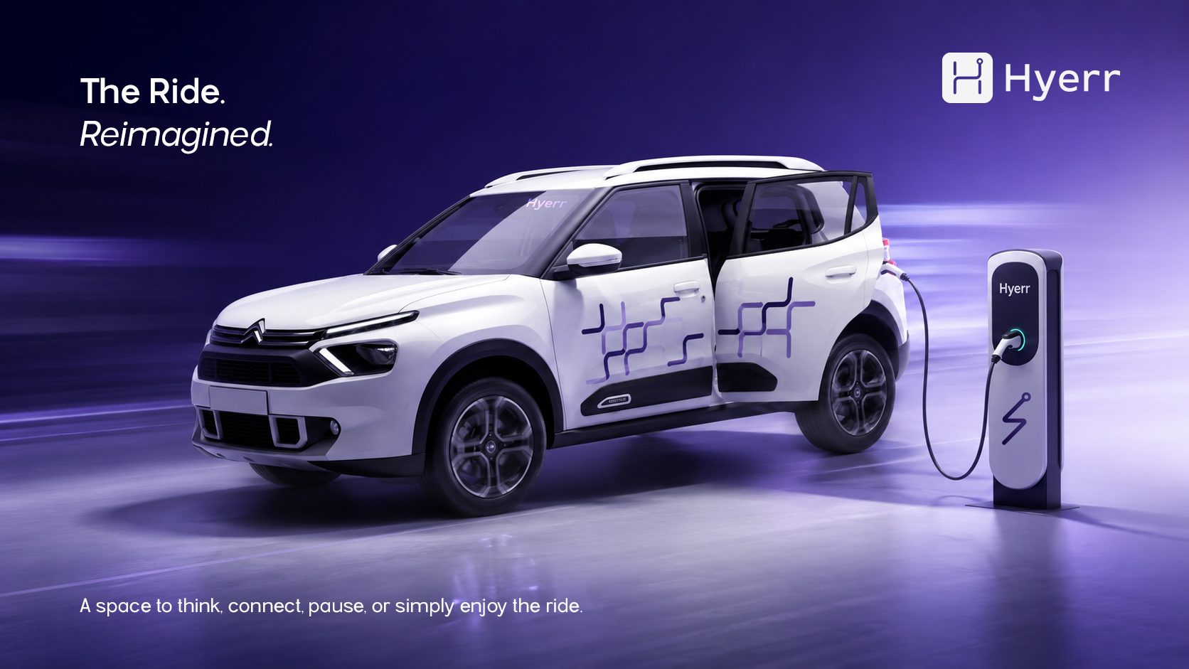 A white SUV in the Hyerr route-line wrap at a charging point